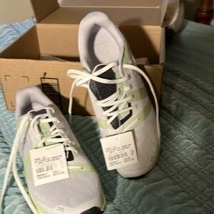 On Running White and Green Sneakers